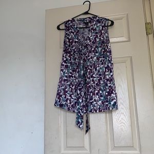 Small sleeveless dress shirt, square patterns are blue & eggplant purple